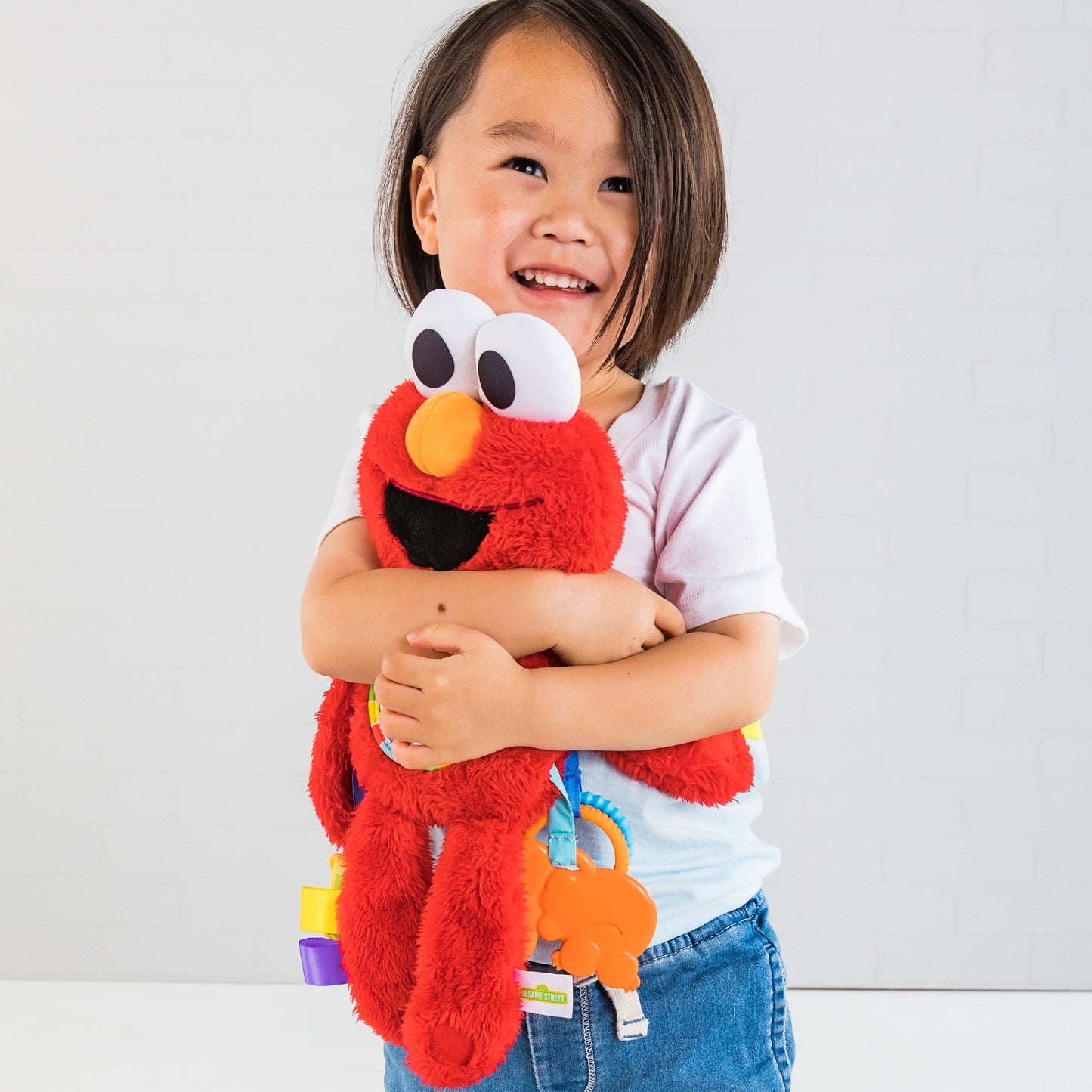 Sesame Street Elmo Travel Buddy Plush Take-Along Stroller Carrier Toy, Ages 0-12 Months