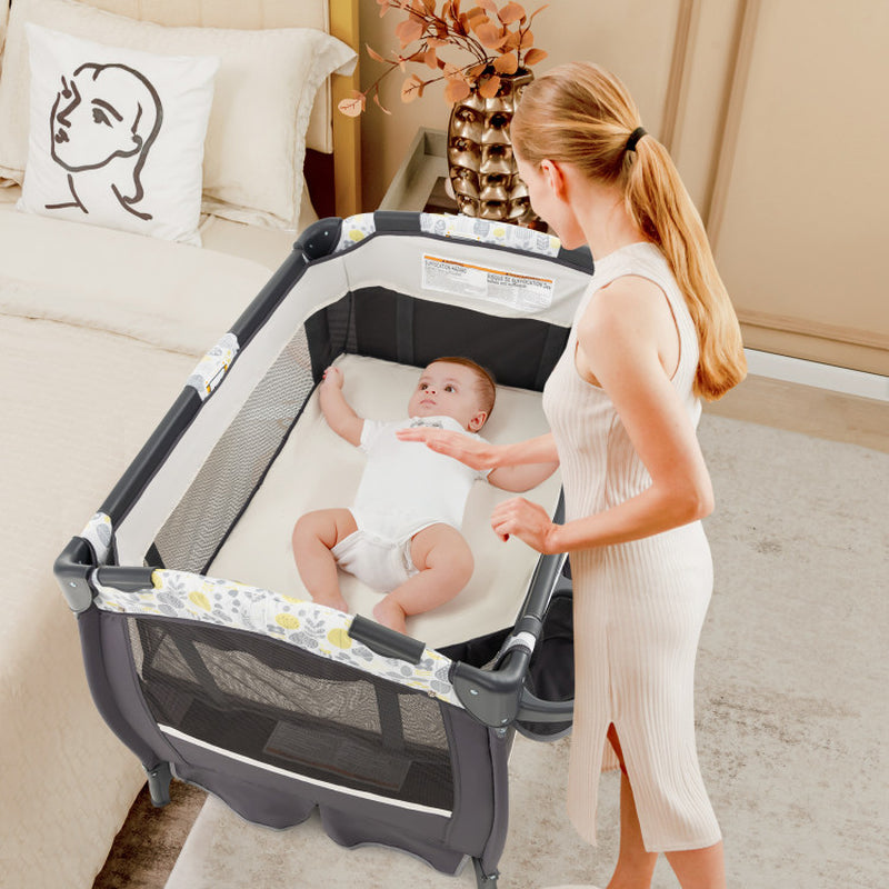 4 in 1 Portable Pack and Play Baby Nursery Center with Bassinet